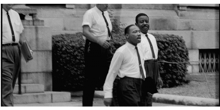Danny Lyon - Martin Luther King, Jr. and Rev. Ralph Abernathy being escorted back to jail in Albany, GA 1962